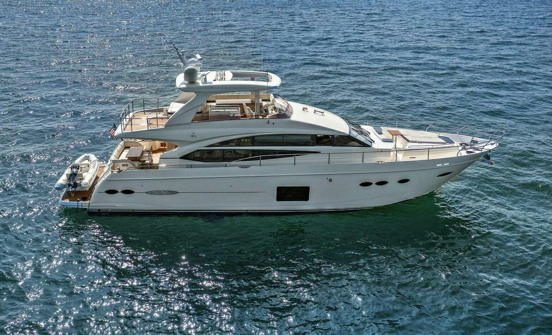 a white yacht in the water aboard LA-Z-BUOY Yacht for Sale