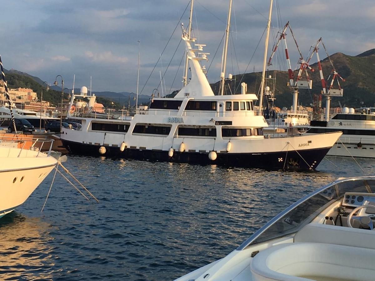 boats are parked in the water aboard ANNA I Yacht for Sale