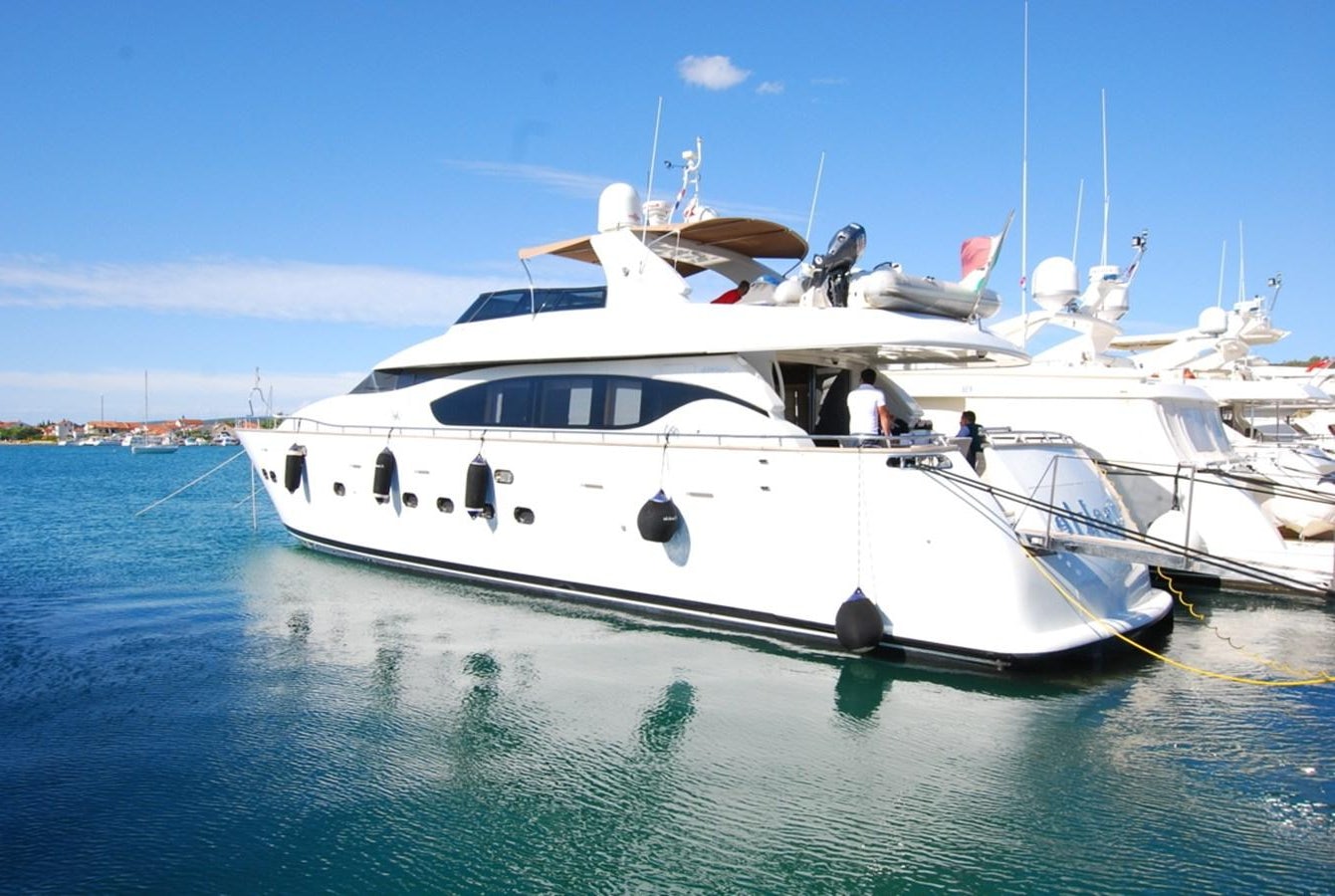 a white boat in the water aboard COOKIE Yacht for Sale