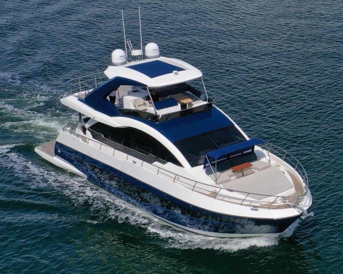 a boat on the water aboard THE ONLY BLUE 66 FLY Yacht for Sale