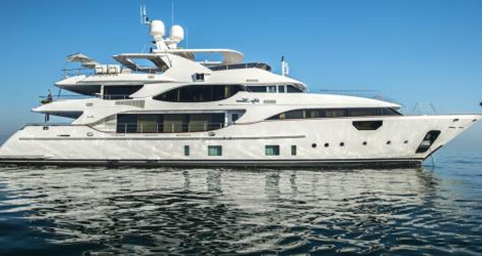 a large white yacht aboard NELA Yacht for Sale