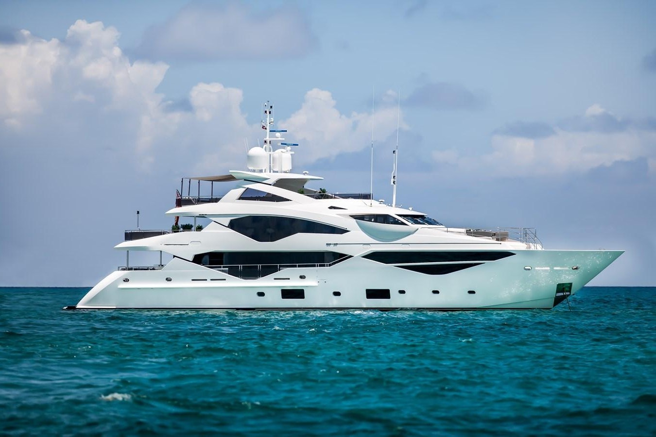 a white yacht in the water aboard CAPTAIN MORGAN III Yacht for Sale