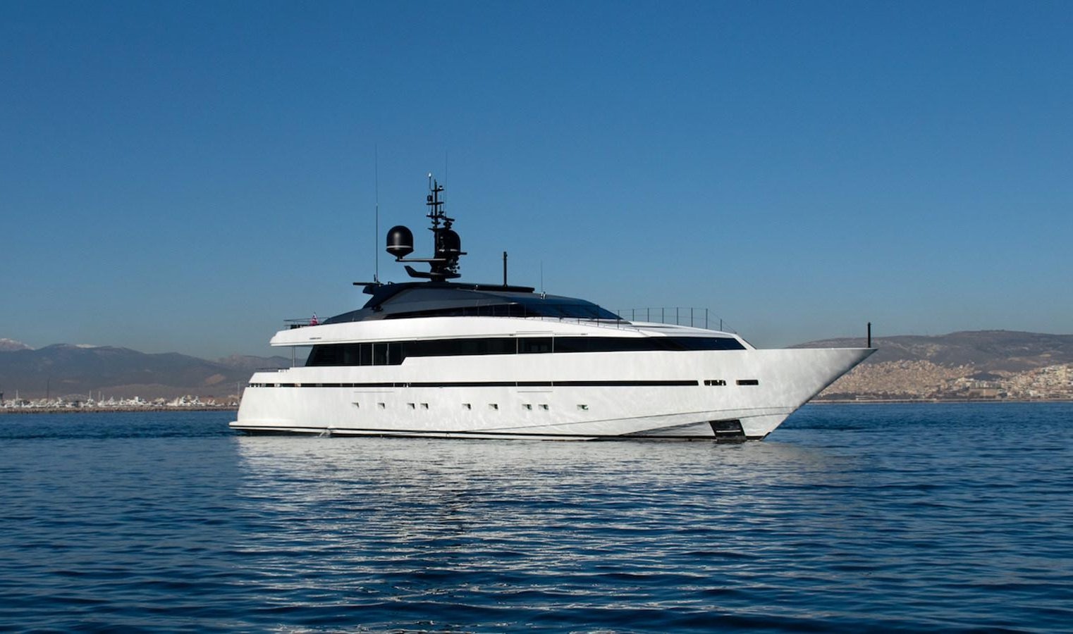 a white boat in the water aboard ASTERI Yacht for Sale