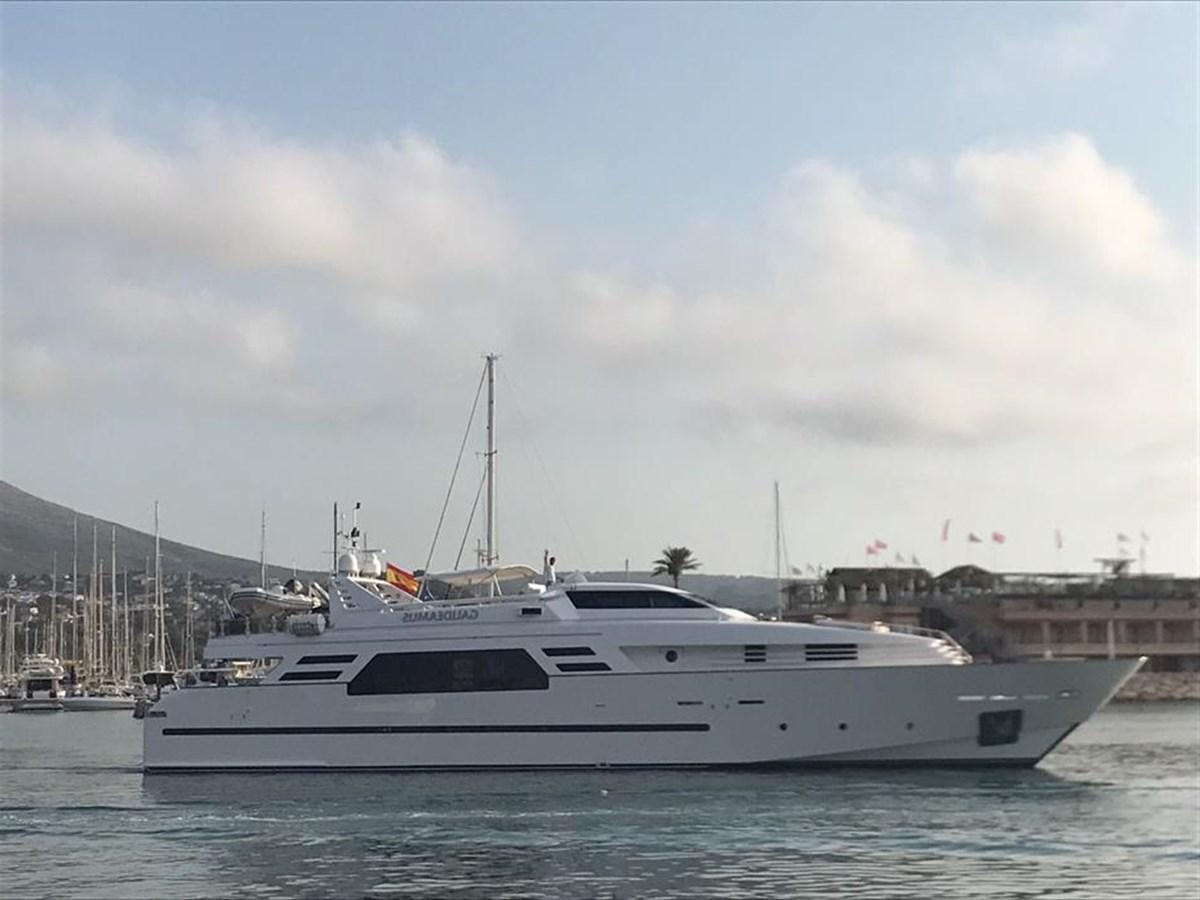 a white yacht in the water aboard GAUDEAMUS Yacht for Sale