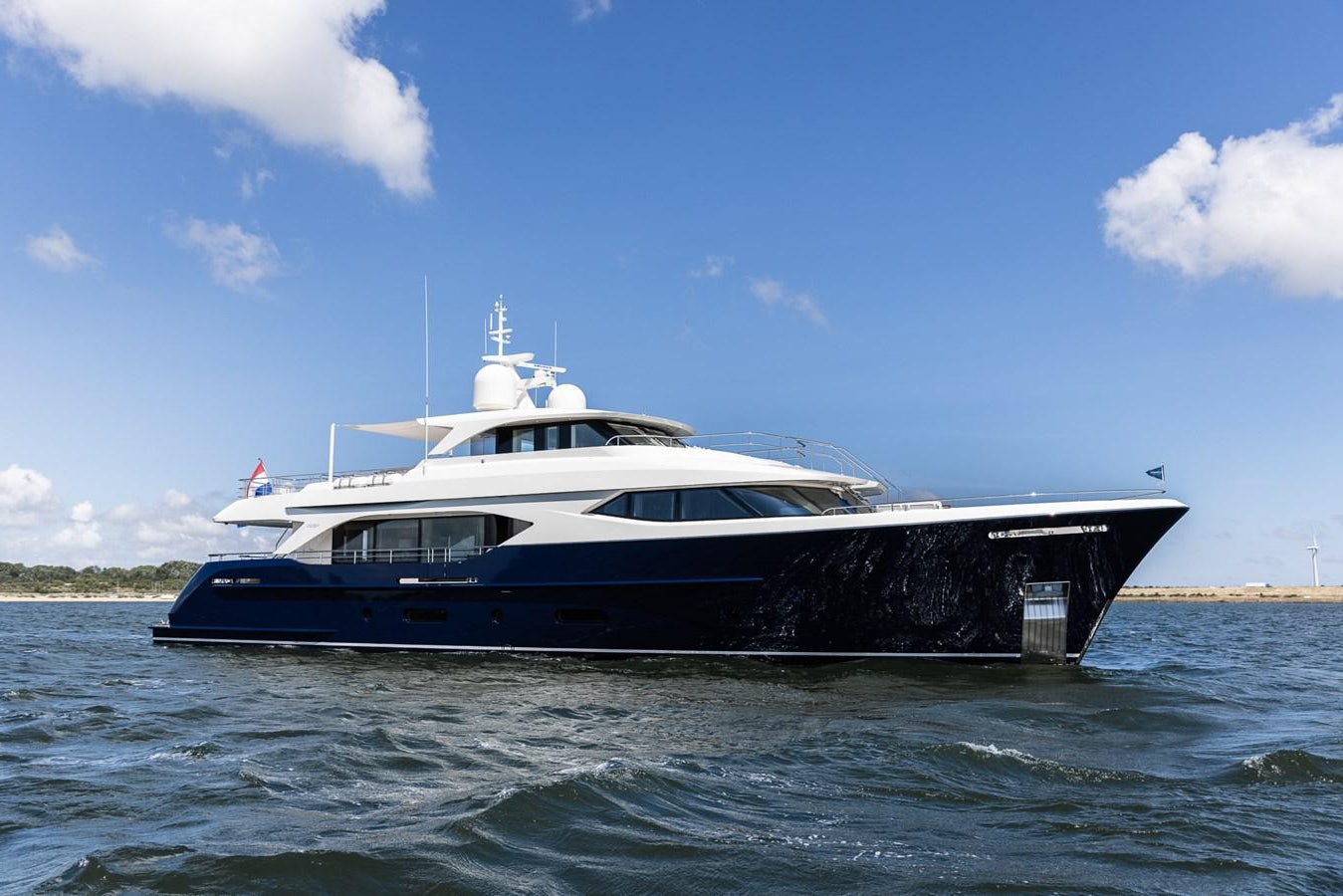 a boat in the water aboard MOONEN 110 MUSTIQUE Yacht for Sale
