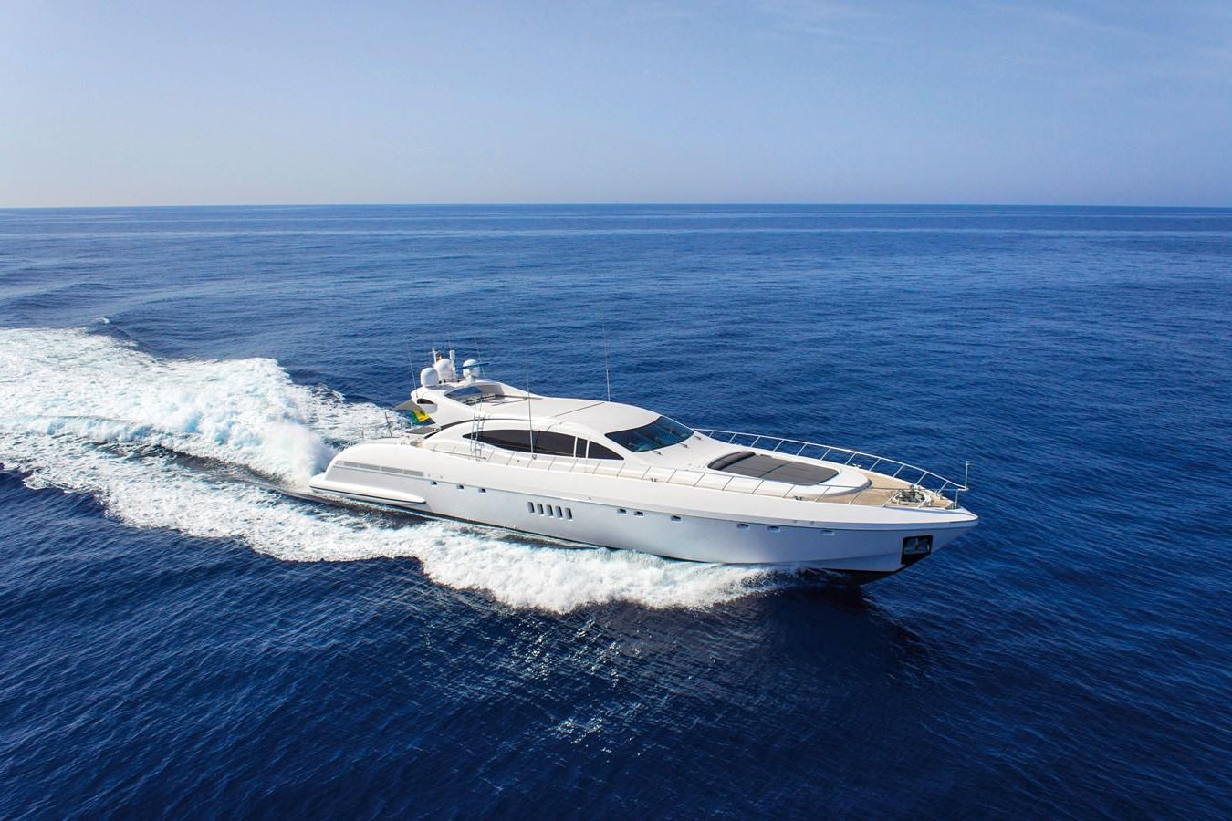 a white yacht on the water aboard LE MAGNIFIQUE Yacht for Sale