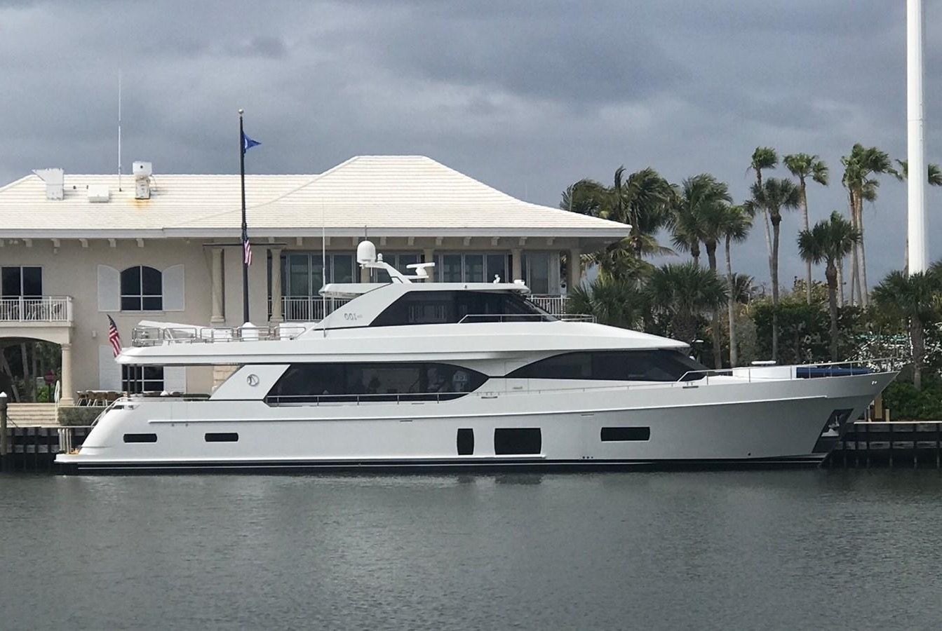 a white yacht in the water aboard SEASONS IN THE SUN Yacht for Sale