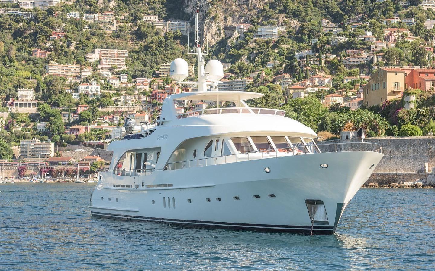 a white boat on water aboard LITTLE PERLE Yacht for Sale