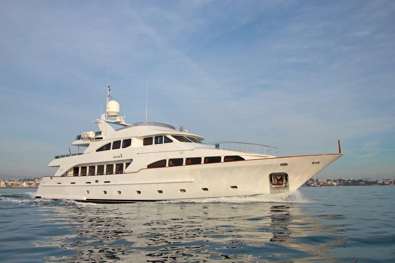 a white yacht on the water aboard INOUIS Yacht for Sale
