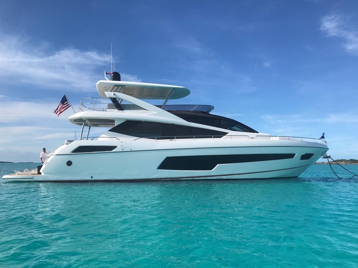 a white boat in the water aboard SECOND THOUGHTS Yacht for Sale