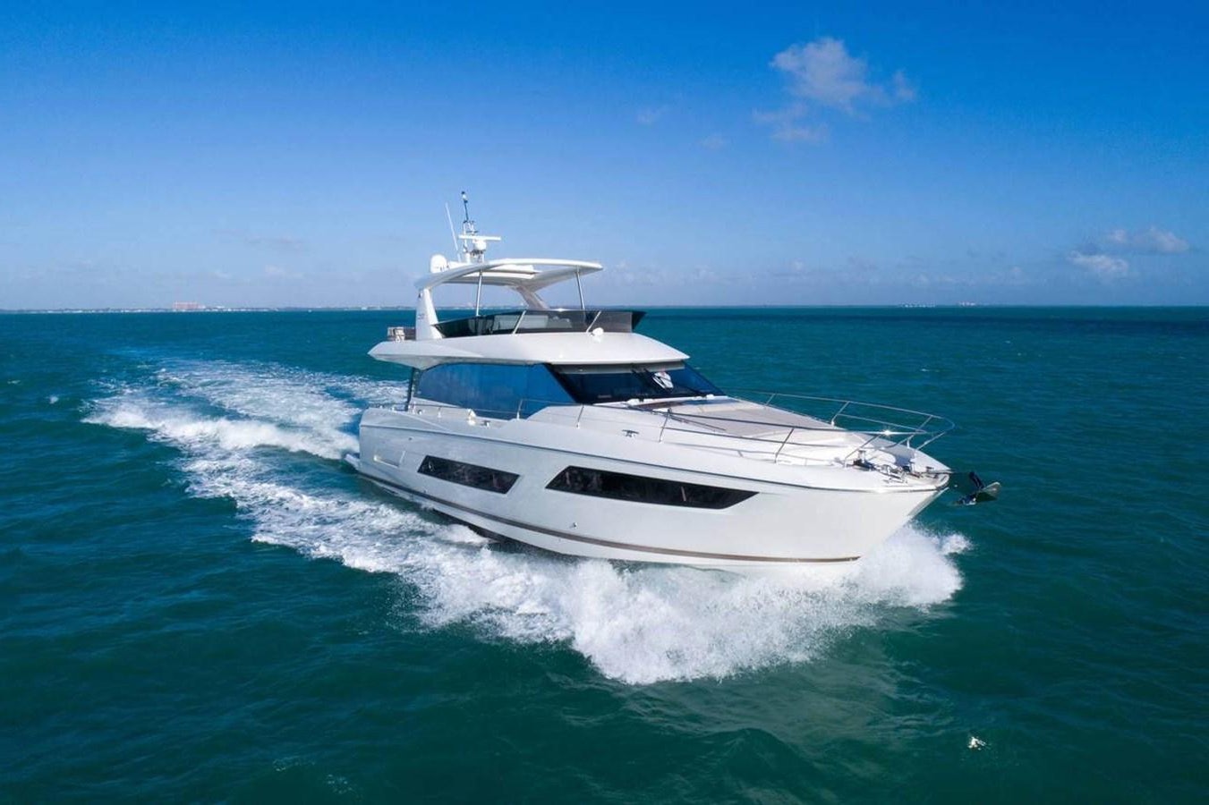 a white yacht on the water aboard MEIGA Yacht for Sale