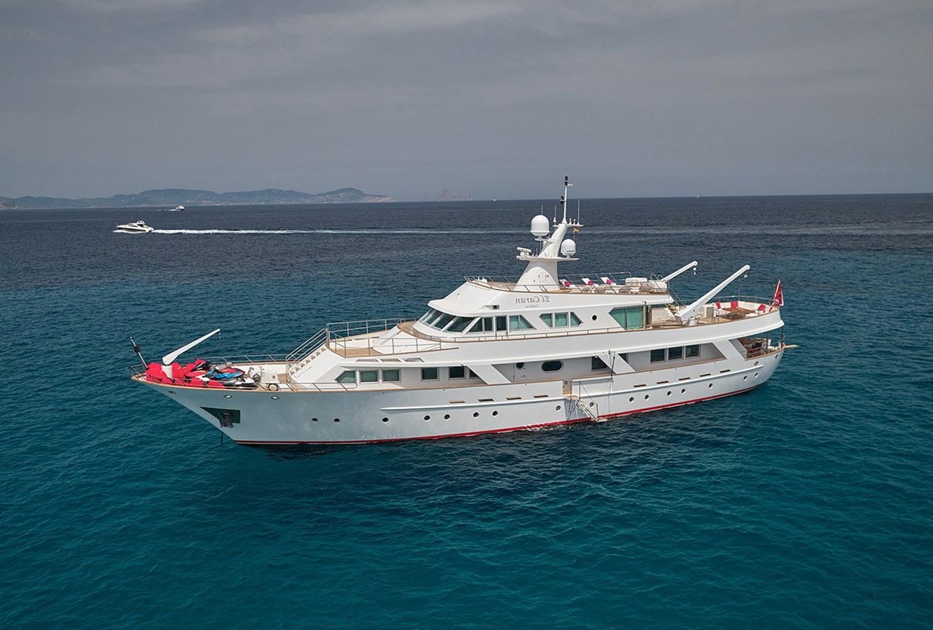 a large white boat in the water aboard EL CARAN Yacht for Sale