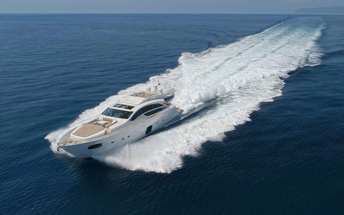 a boat on the water aboard HIT Yacht for Sale