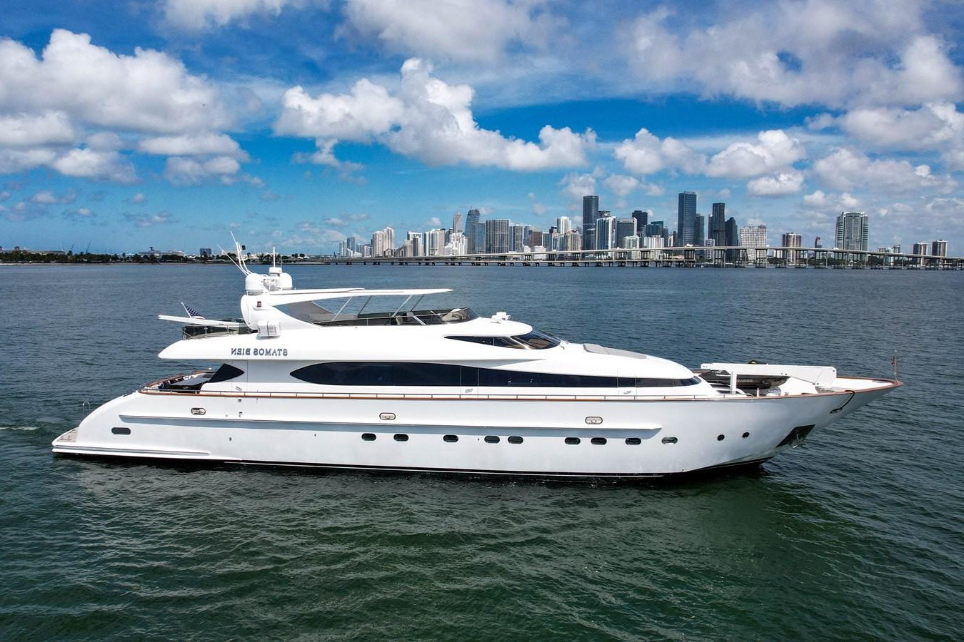 a white yacht in the water aboard STAMOS BIEN Yacht for Sale