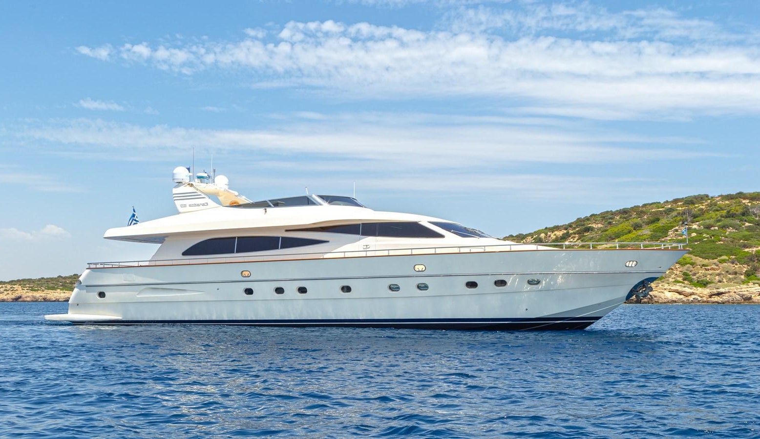 a white yacht on the water aboard VYNO Yacht for Sale