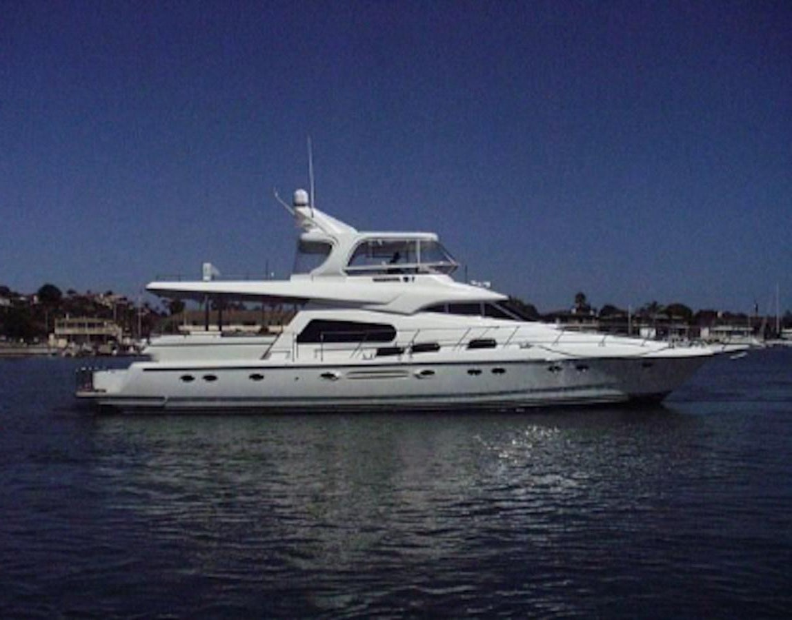 a white yacht on the water aboard THE FLYING WASP Yacht for Sale