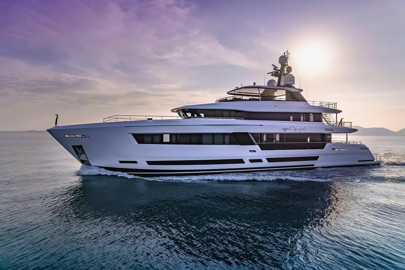 a white yacht in the water aboard SONG OF SONGS Yacht for Sale