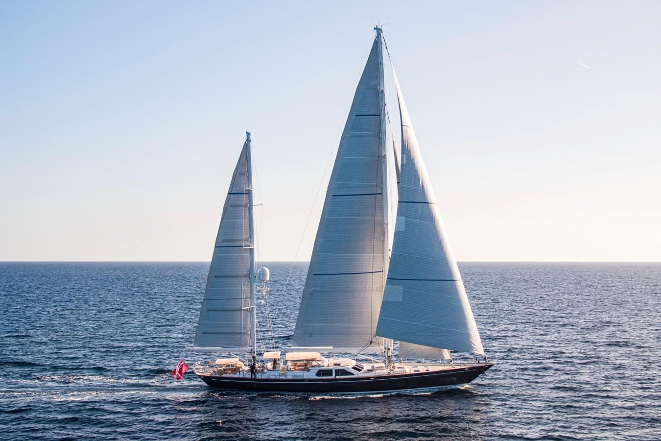 a sailboat in the water aboard LEGEND Yacht for Sale