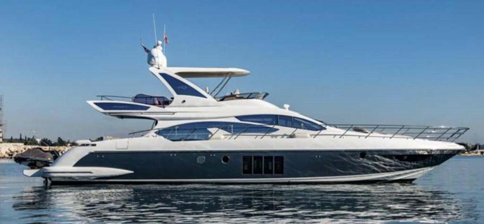 a white yacht on the water aboard AZIMUT 64 FLY 2014 Yacht for Sale