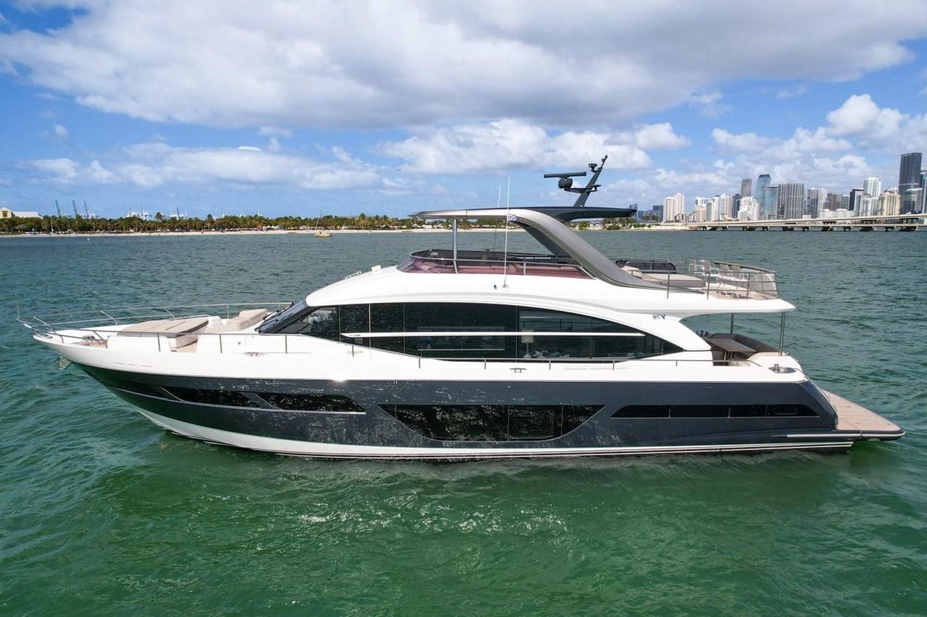 a white yacht in the water aboard 78' PRINCESS Y78 2021 Yacht for Sale