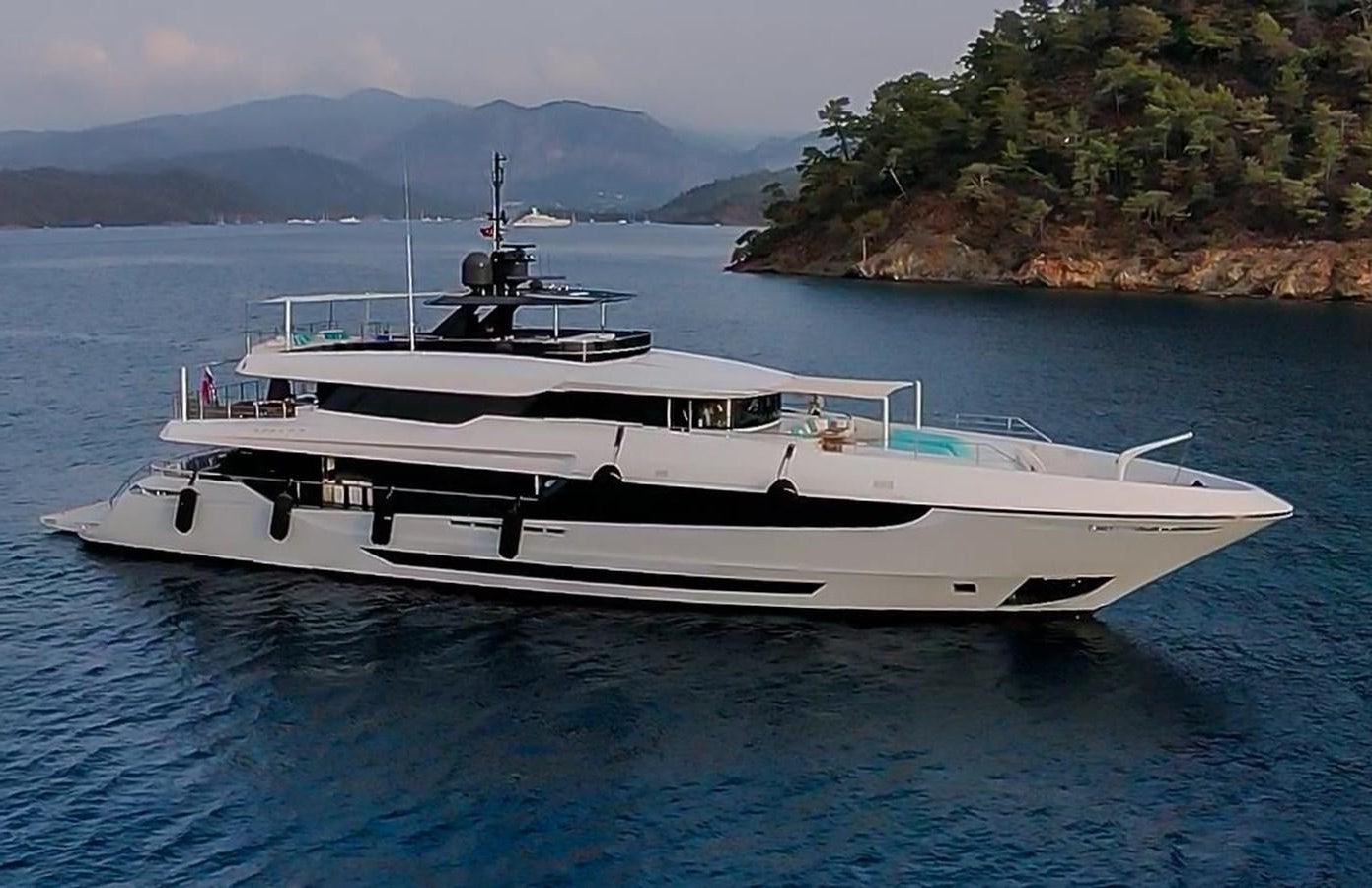 a white yacht in the water aboard SUNNY Yacht for Sale