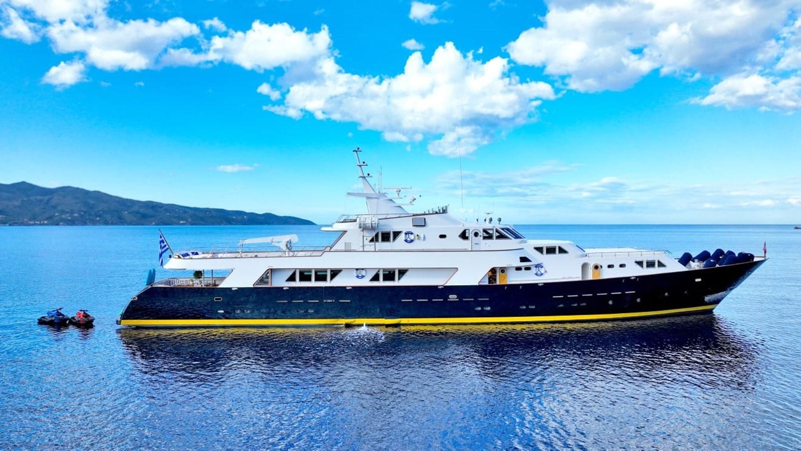a boat on the water aboard SOMETHING COOL Yacht for Sale