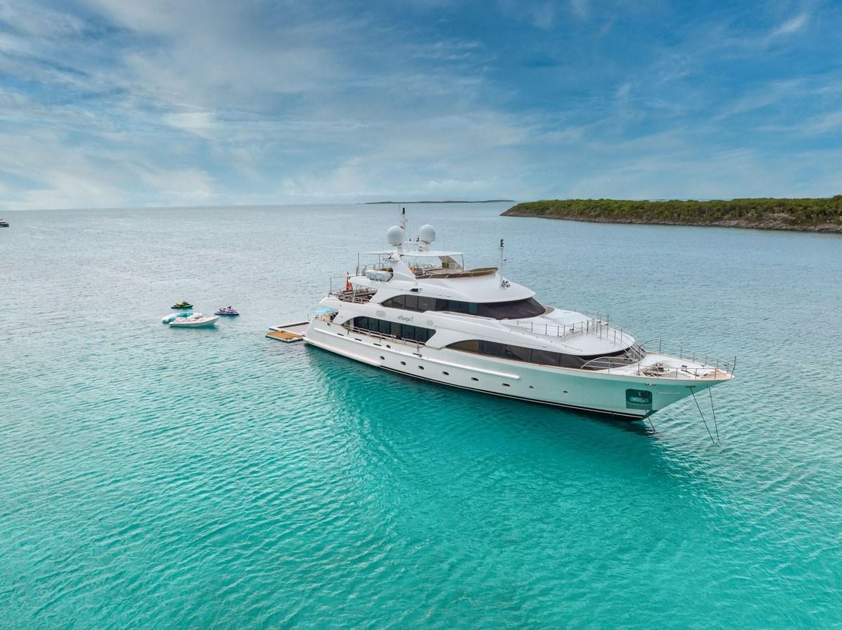 a white boat in the water aboard PAPAITO Yacht for Sale