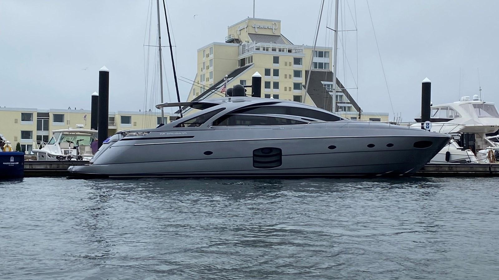 a yacht docked at a pier aboard THE OFFICE Yacht for Sale