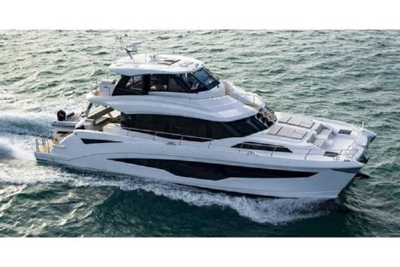 a white yacht in the water aboard 2021 AQUILA 70 LUXURY Yacht for Sale
