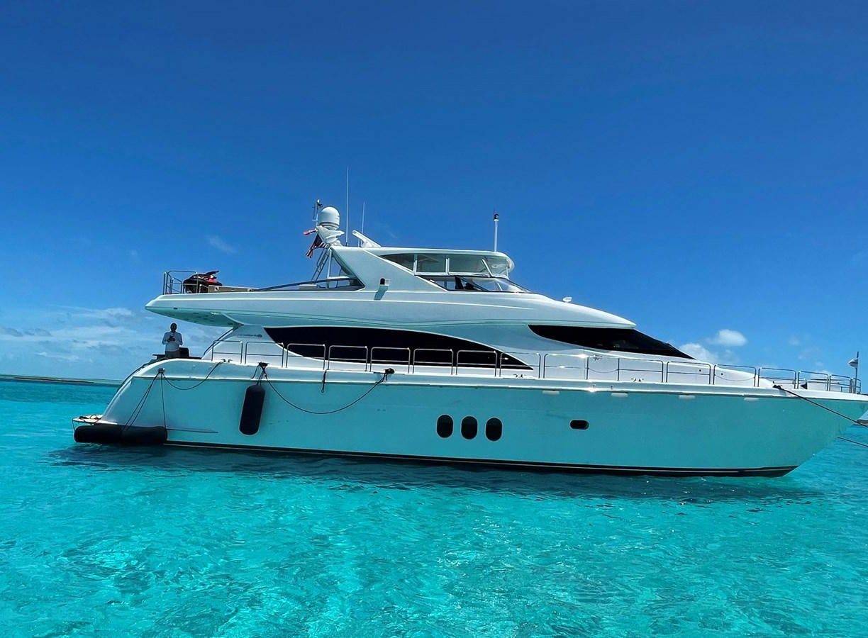 a white yacht in the water aboard ARETECTE Yacht for Sale