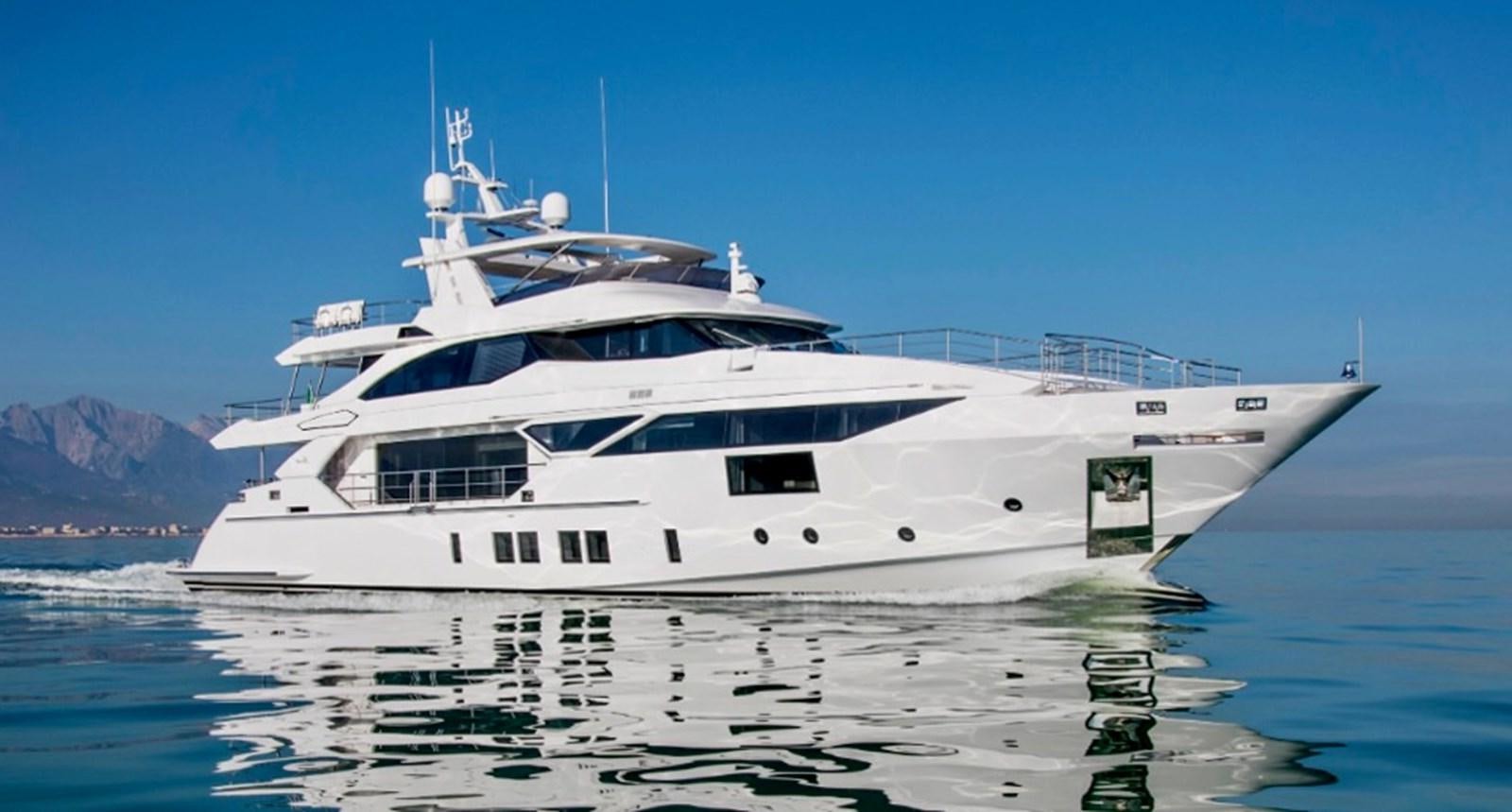 a white yacht in the water aboard O3 Yacht for Sale
