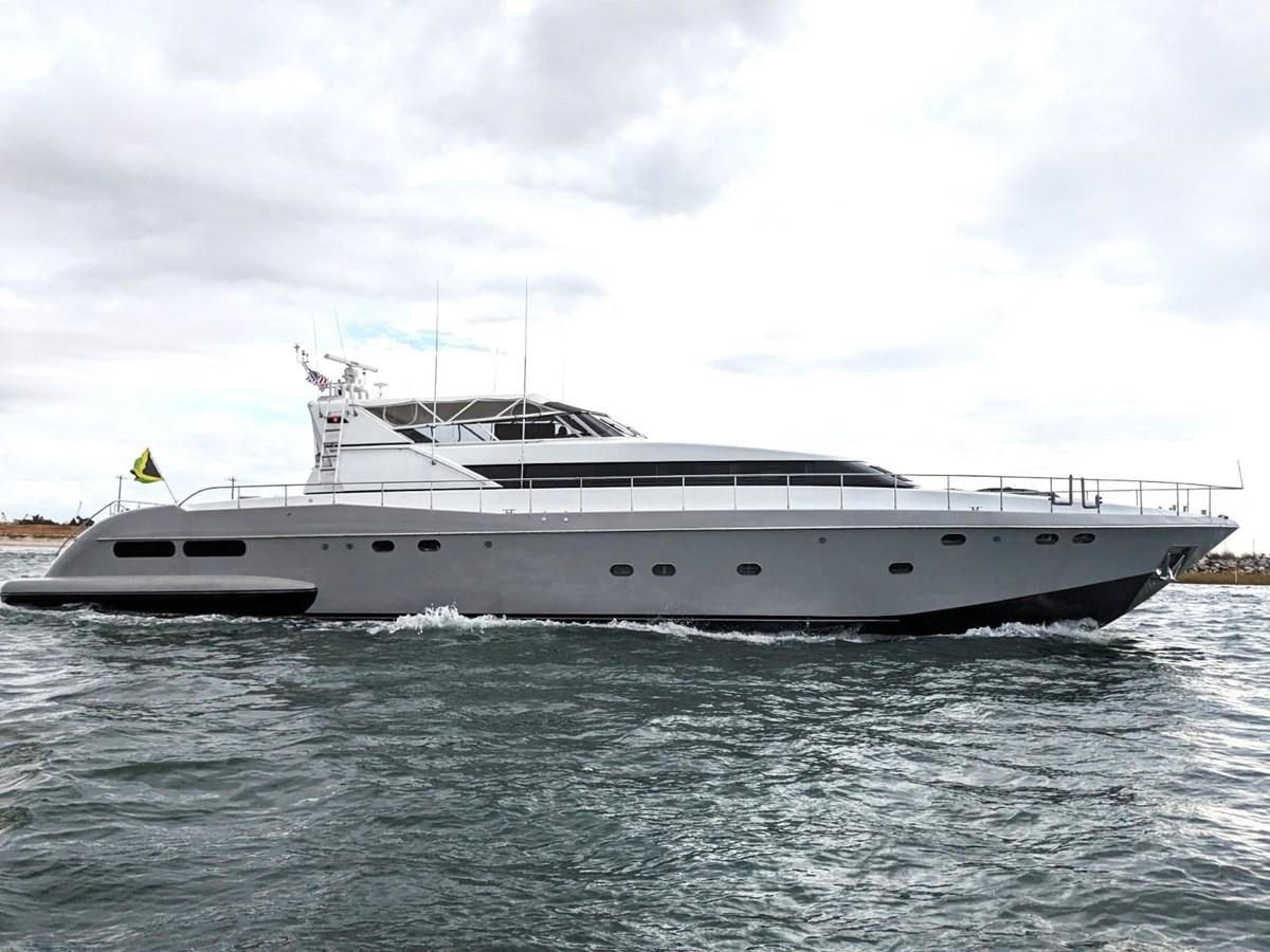 a white yacht on the water aboard ALCHEMIST Yacht for Sale