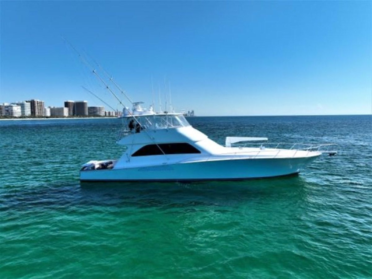 a white boat in the water aboard LIKE WHAT U SEA Yacht for Sale