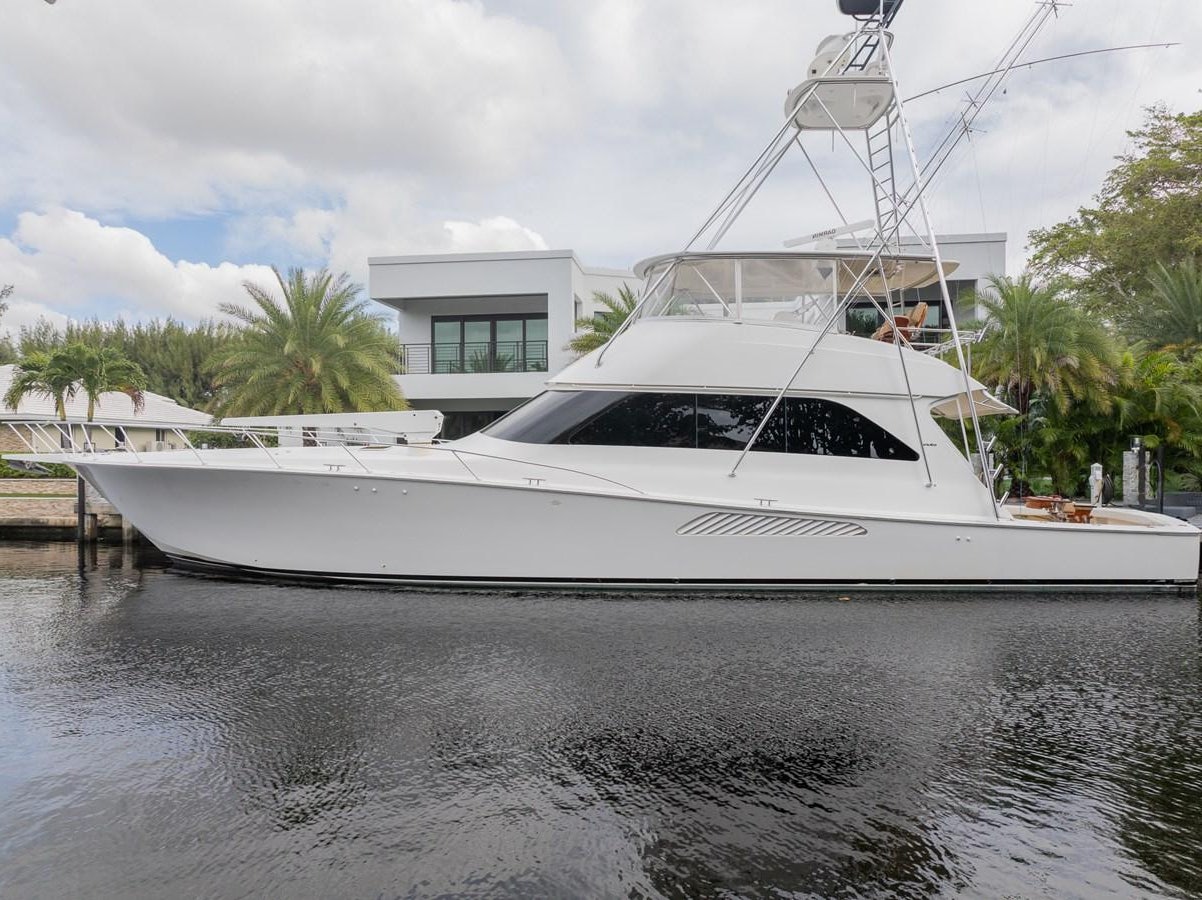 a white boat on the water aboard STABILIZED Yacht for Sale
