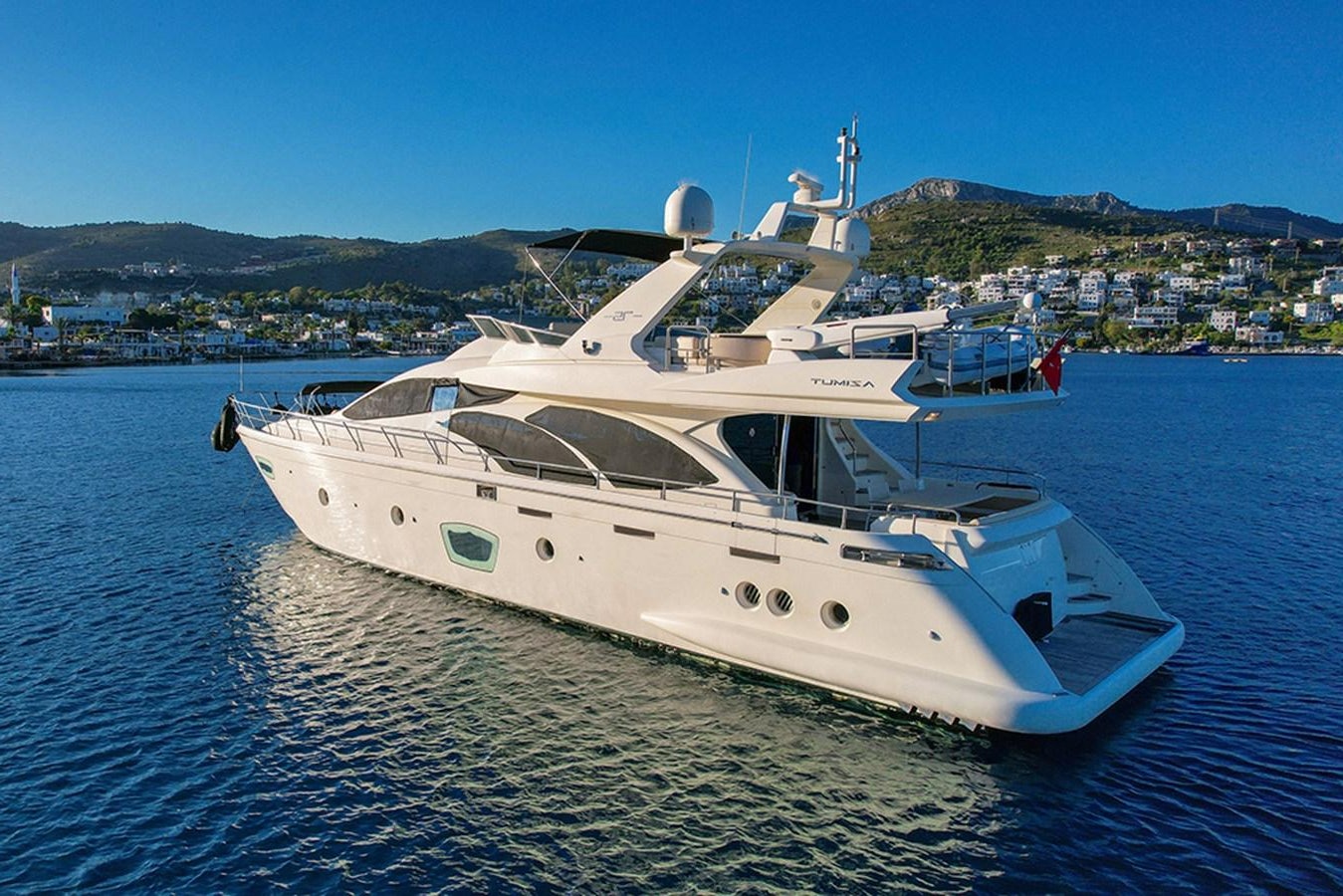 a white yacht on the water aboard AZIMUT 88 Yacht for Sale