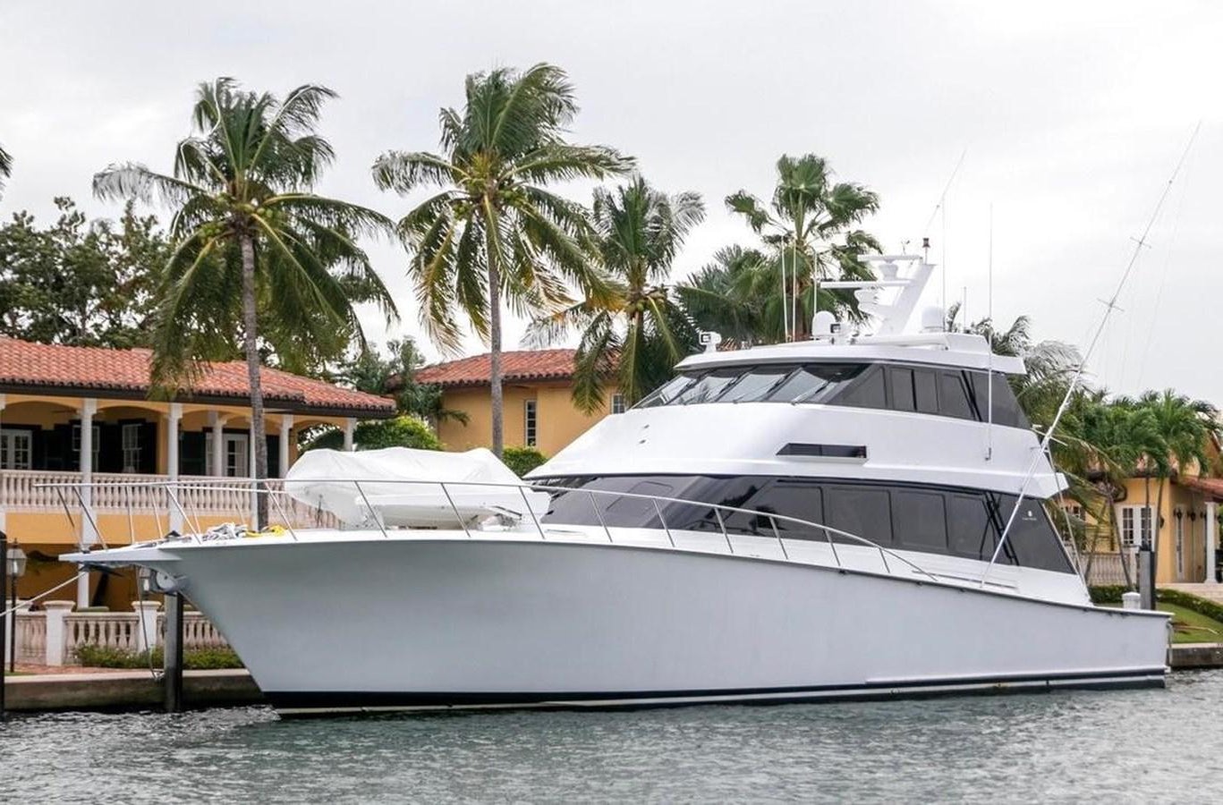 a boat docked at a pier aboard CHAIRMAN Yacht for Sale