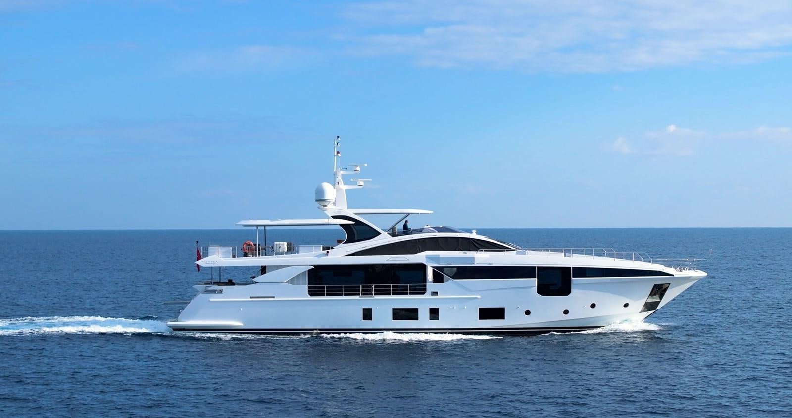 a white yacht in the water aboard IRYNA Yacht for Sale
