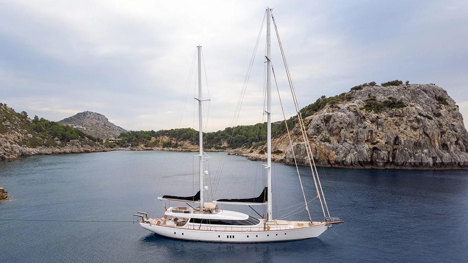 a boat on the water aboard CUSTOM MOTORSAILOR Yacht for Sale