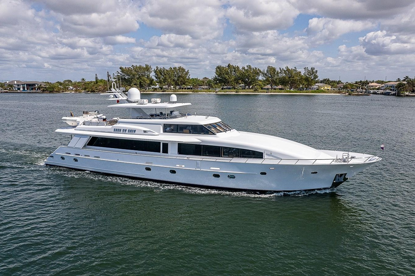 a white yacht in the water aboard WIRE WE HERE Yacht for Sale