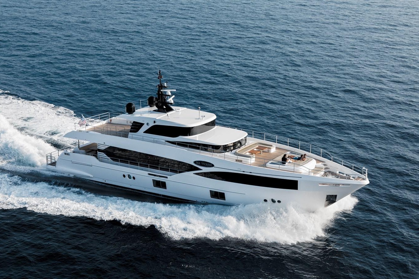 a white yacht in the water aboard #5 MAJESTY 100 Yacht for Sale
