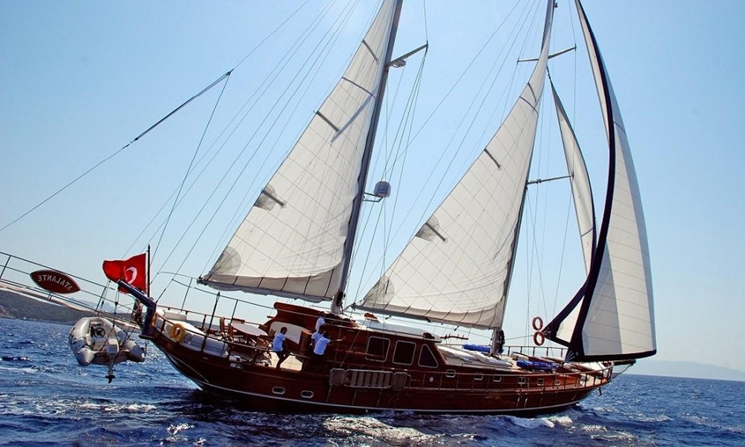 a boat sailing on the sea aboard ATALANTE Yacht for Sale