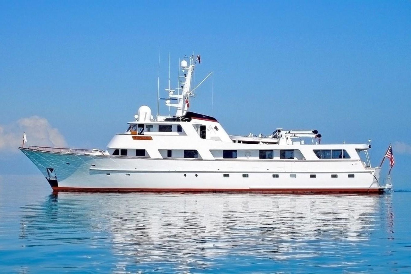 a large white boat aboard BUCKPASSER Yacht for Sale
