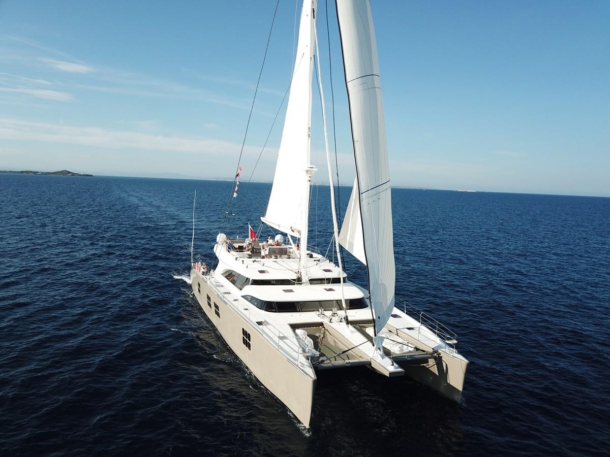 a white boat in the water aboard IPHARRA Yacht for Sale