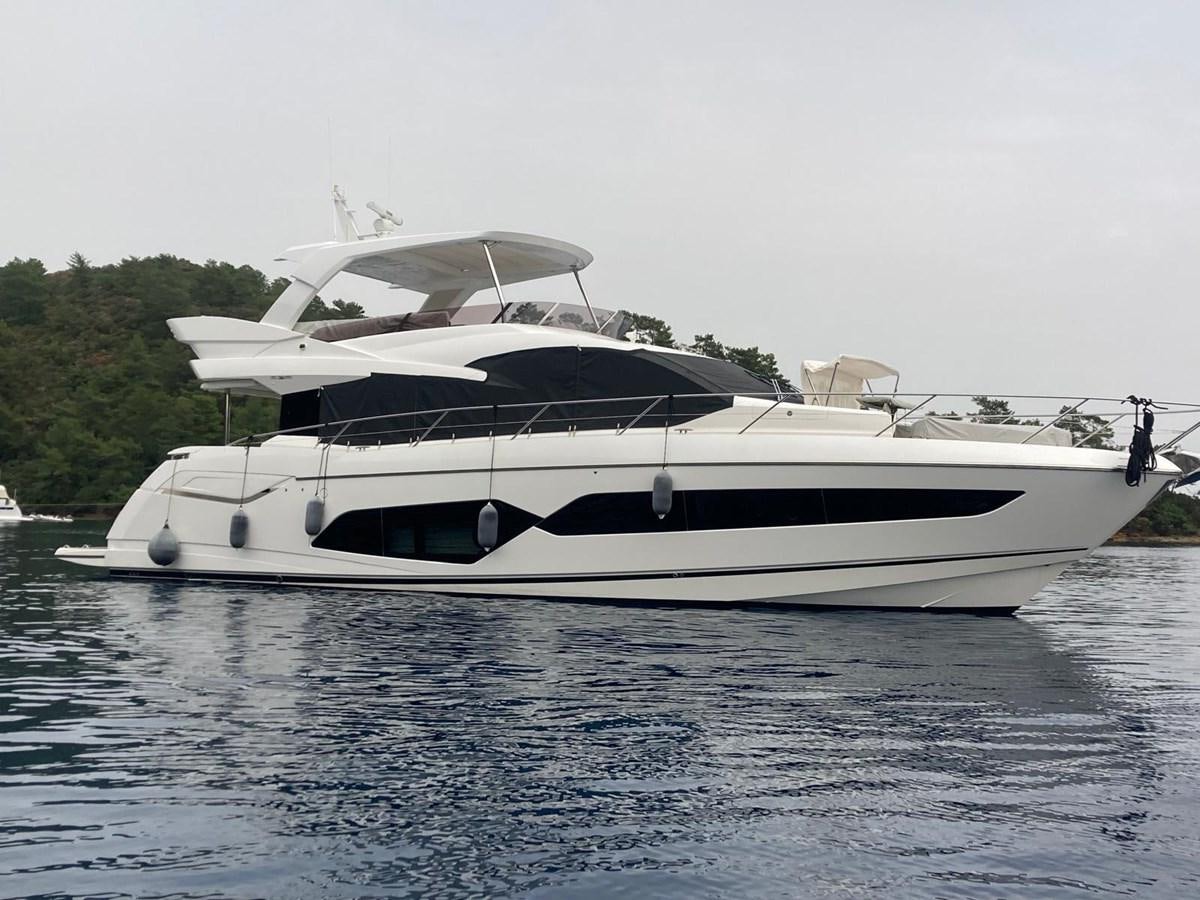 a white yacht on the water aboard CENGIZ Yacht for Sale