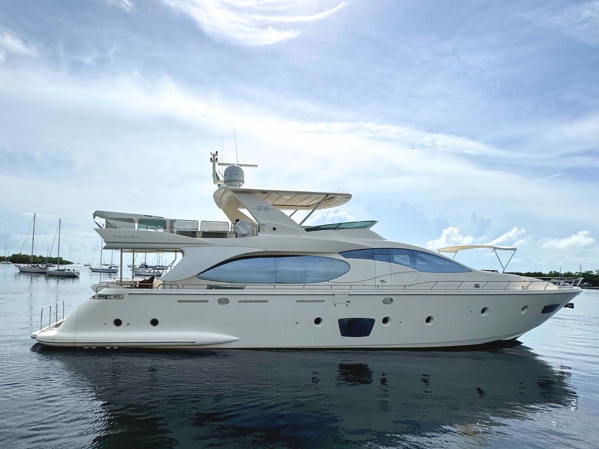 a white yacht in the water aboard AZIMUT 85 FLY Yacht for Sale