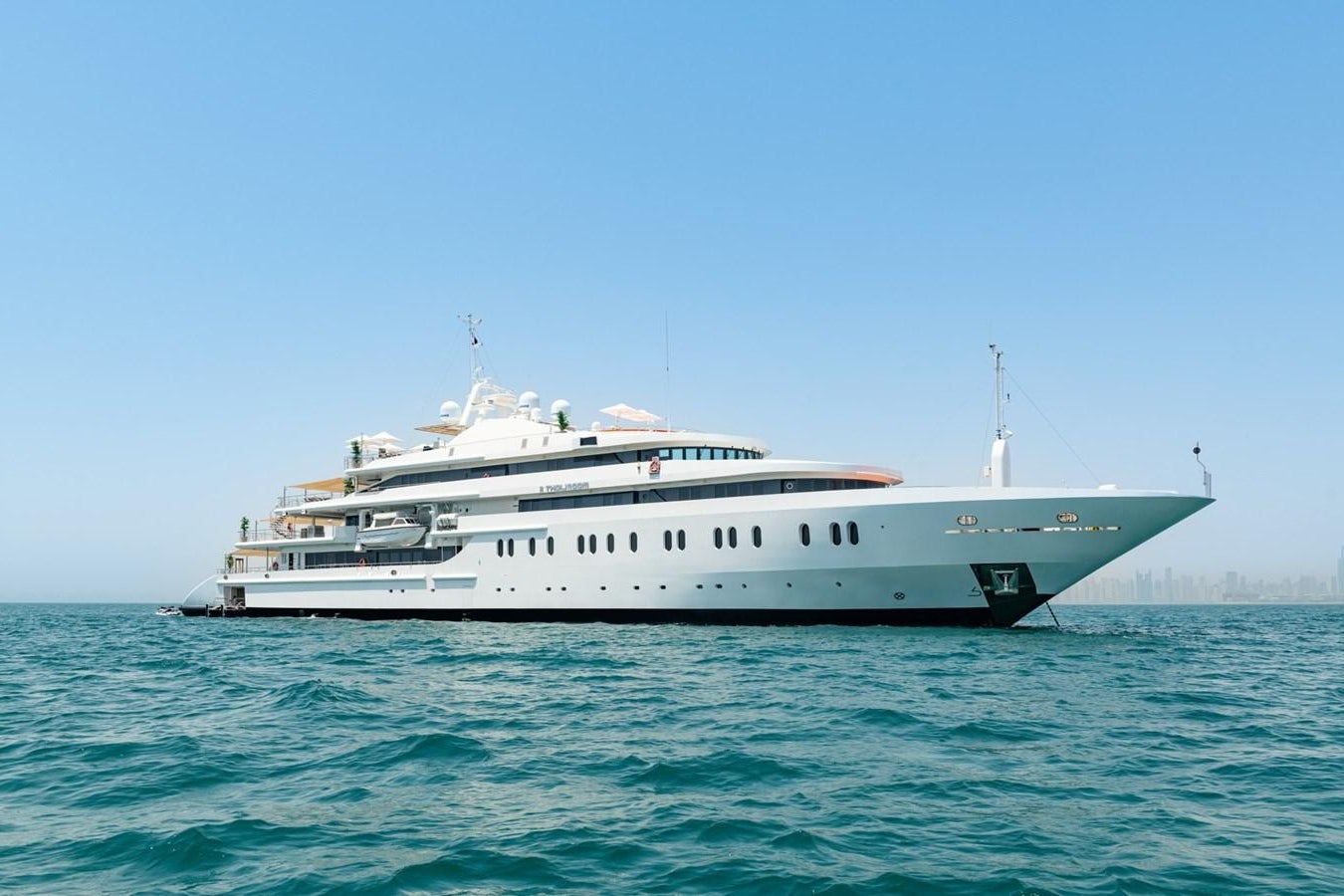 a white yacht in the water aboard MOONLIGHT II Yacht for Sale