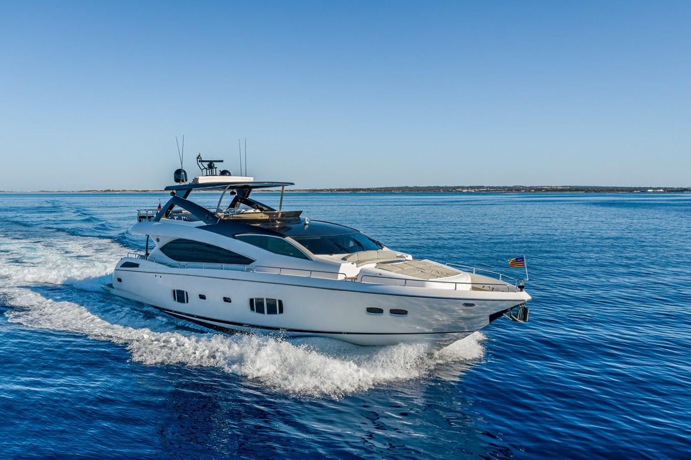 a white yacht on the water aboard MOZZ II Yacht for Sale
