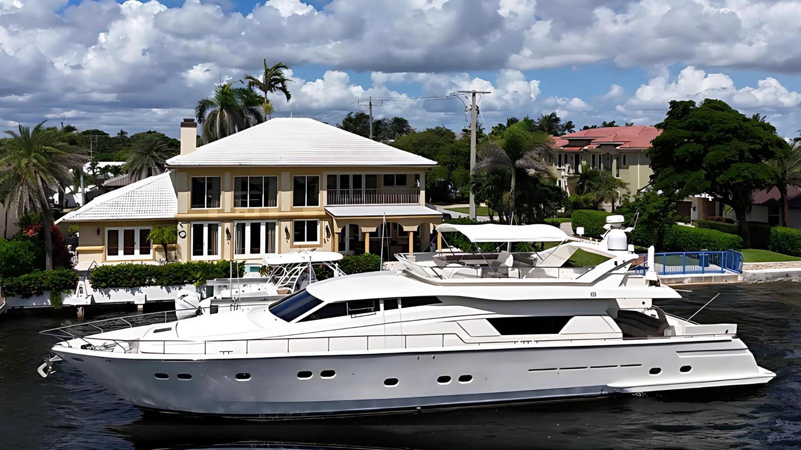 a boat in the water aboard 1998 FERRETTI 80FT Yacht for Sale