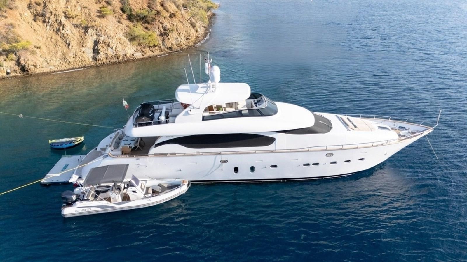 a boat and a small boat in the water aboard MAIORA 26 Yacht for Sale