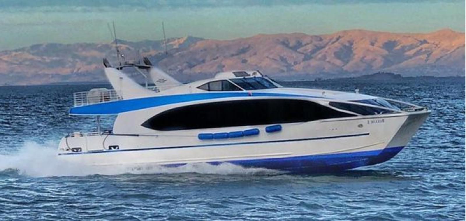 a boat on the water aboard F350TXR Yacht for Sale